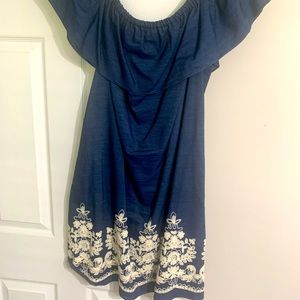 Off shoulder dress. Light denim material with design.